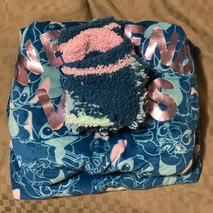 Stich pajama set. Pants, shirt and socks. Only worn once